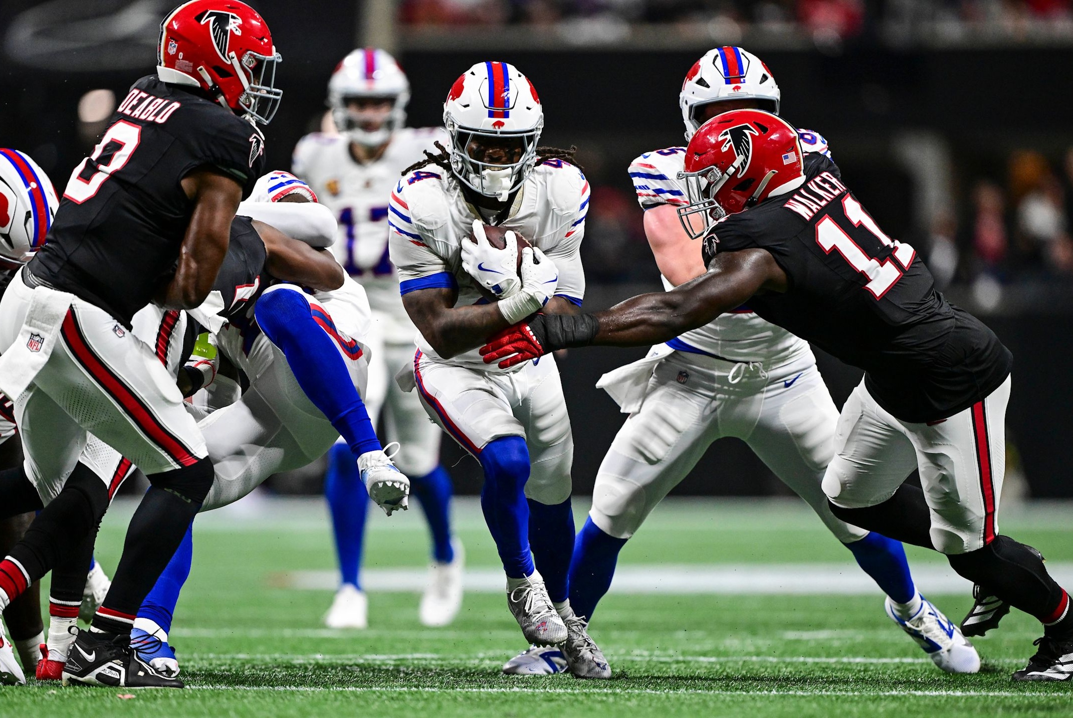 Bills running back James Cook III runs with the ball in a Week 6 loss to the Falcons in the 2025 NFL season.