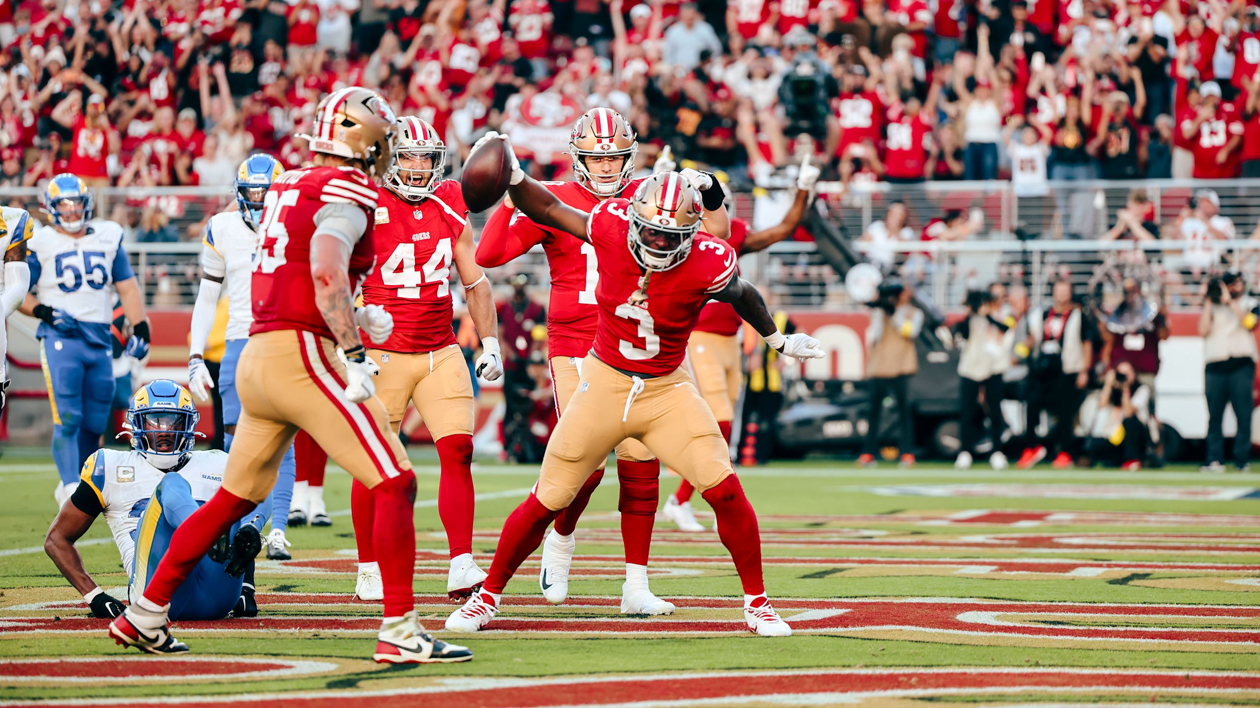 49ers running back Brian Robinson Jr. celebrates following a touchdown run in a Week 10 loss to the Rams in the 2025 NFL season.