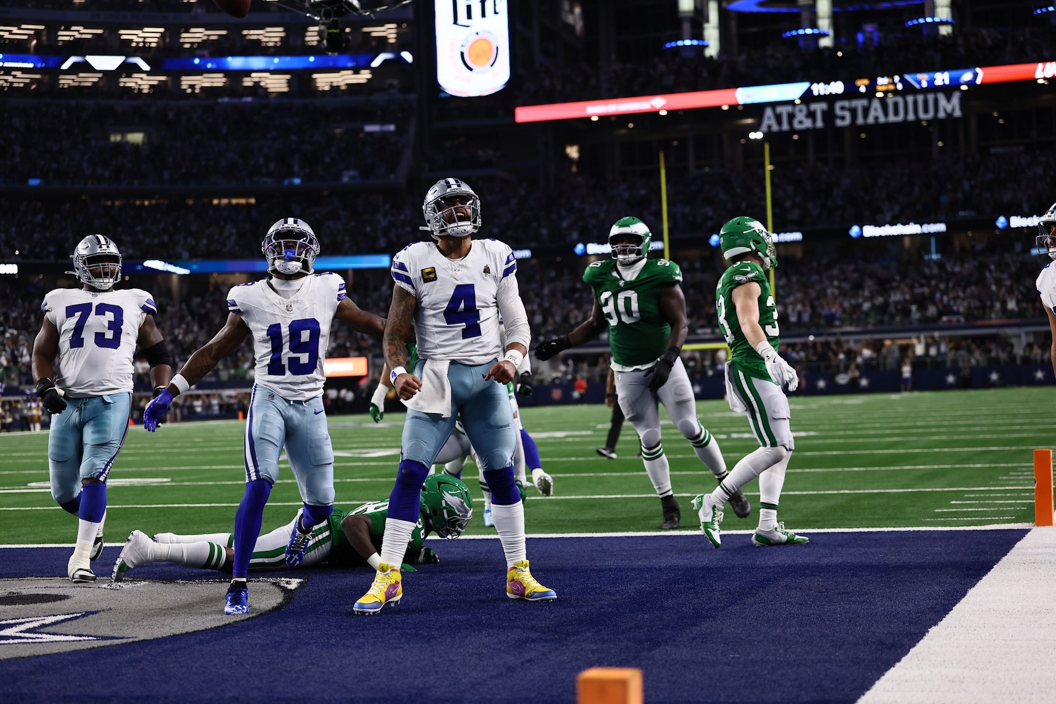 Cowboys quarterback Dak Prescott celebrates following a touchdown run in a comeback 24-21 win over the Eagles in Week 12 of the 2025 NFL season.