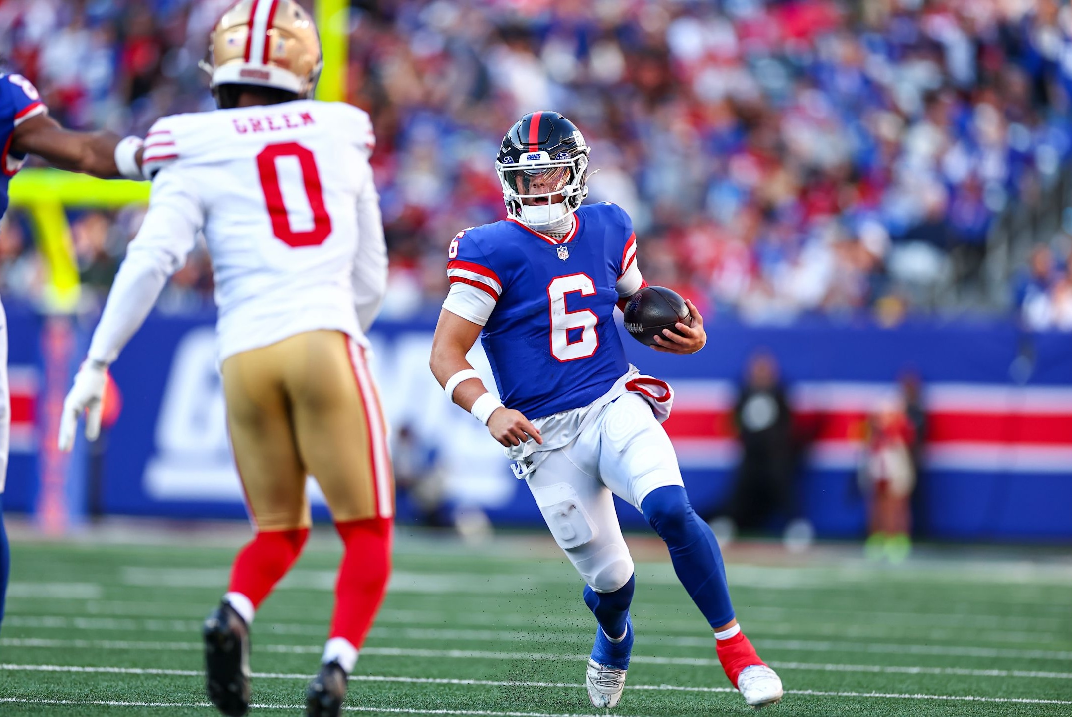 Giants quarterback Jaxson Dart runs in a 34-24 loss to the 49ers in Week 9 of the 2025 NFL season.