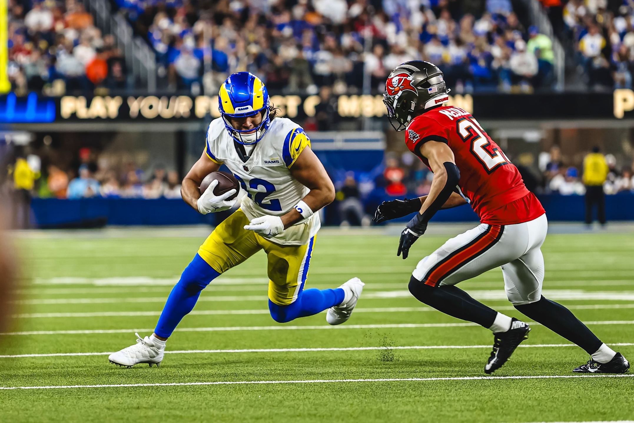 Rams wide receiver Puka Nacua runs after the catch in a 34-7 win over the Buccaneers in Week 12 of the 2025 NFL season.
