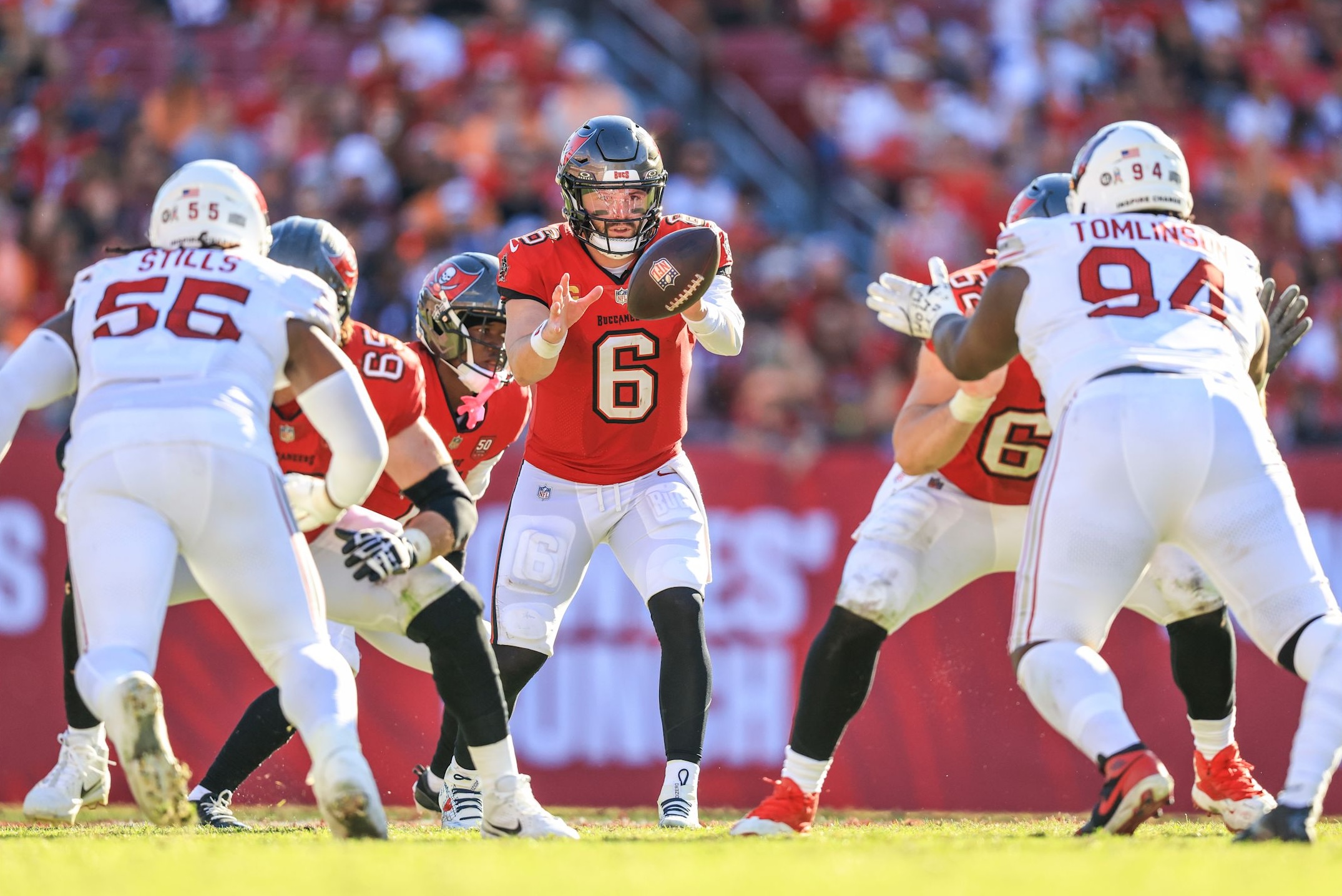 Buccaneers quarterback Baker Mayfield takes a snap in a 20-17 win over the Cardinals in Week 13 of the 2025 NFL season.