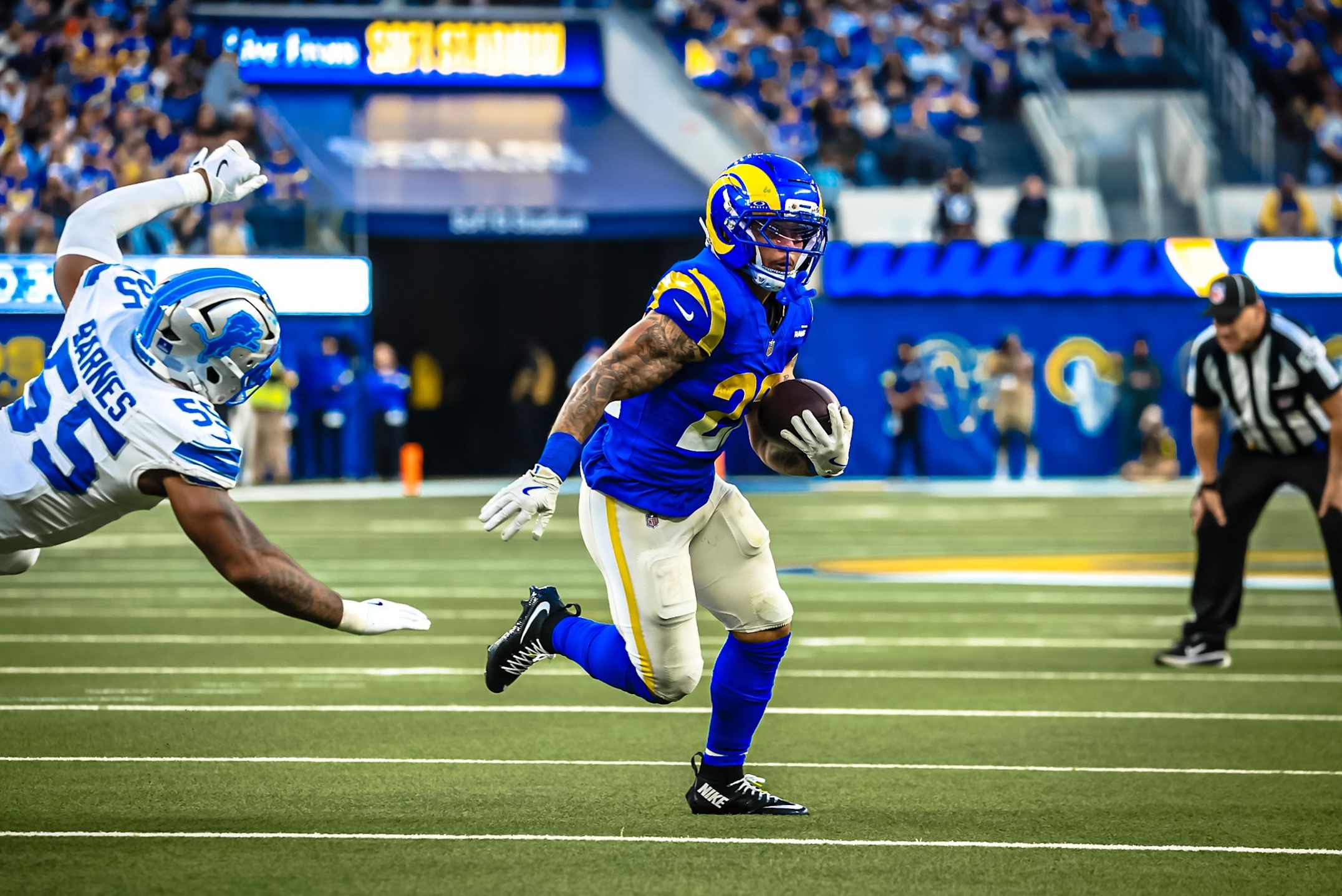 Rams running back Blake Corum carries the ball in a big game as Los Angeles defeated Detroit, 41-34, in Week 15 of the 2025 NFL season.