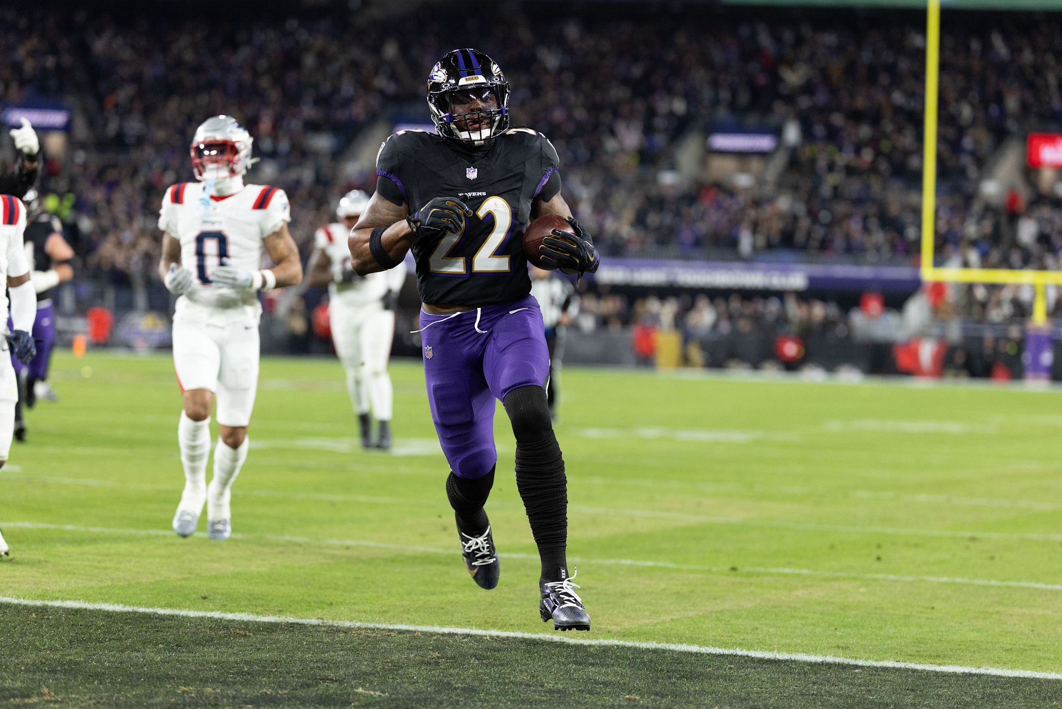 Ravens running back Derrick Henry rushes for a touchdown in the first quarter of a 28-24 loss to the Patriots in Week 16 of the 2025 NFL season.