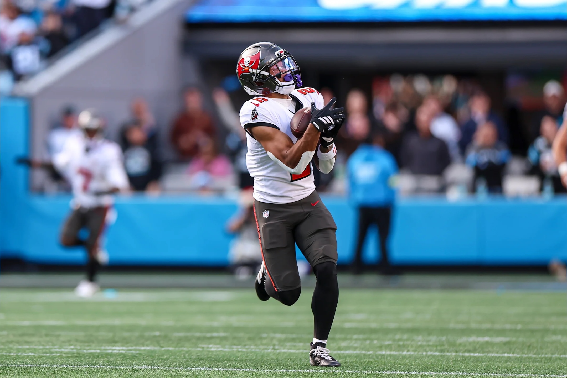 Tampa Bay Buccaneers wide receiver Emeka Egbuka makes a 40-yard catch against the Carolina Panthers in a 2025 NFL game.