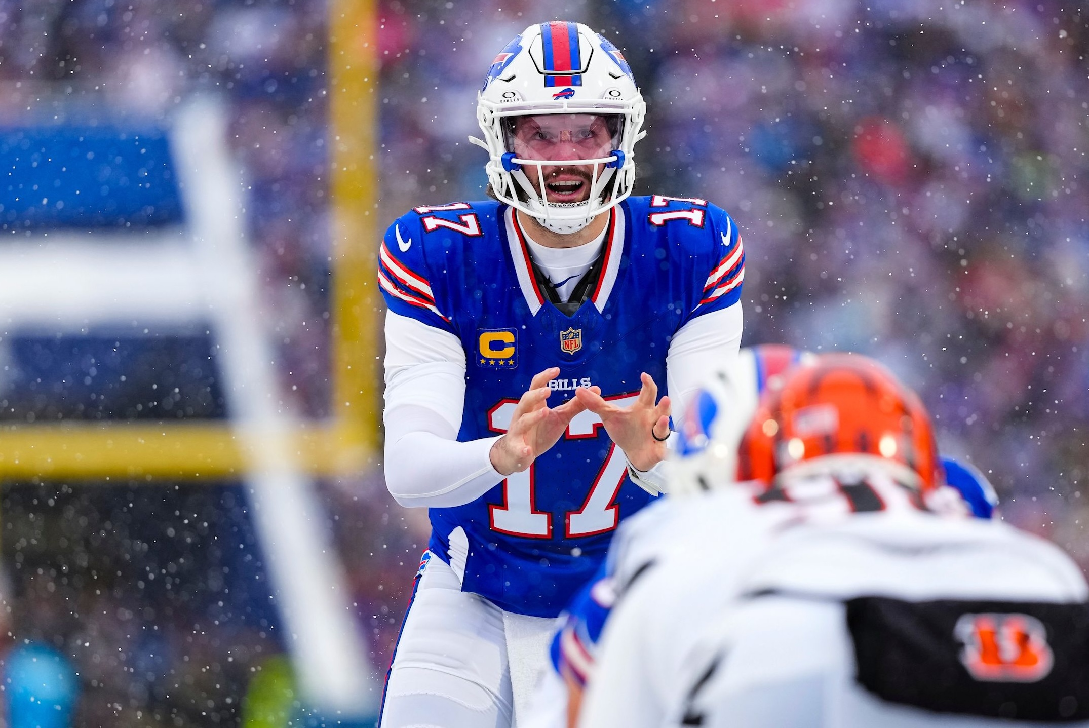 Bills quarterback Josh Allen takes a snap in a 39-34 win over the Bengals in Week 14 of the 2025 NFL season.