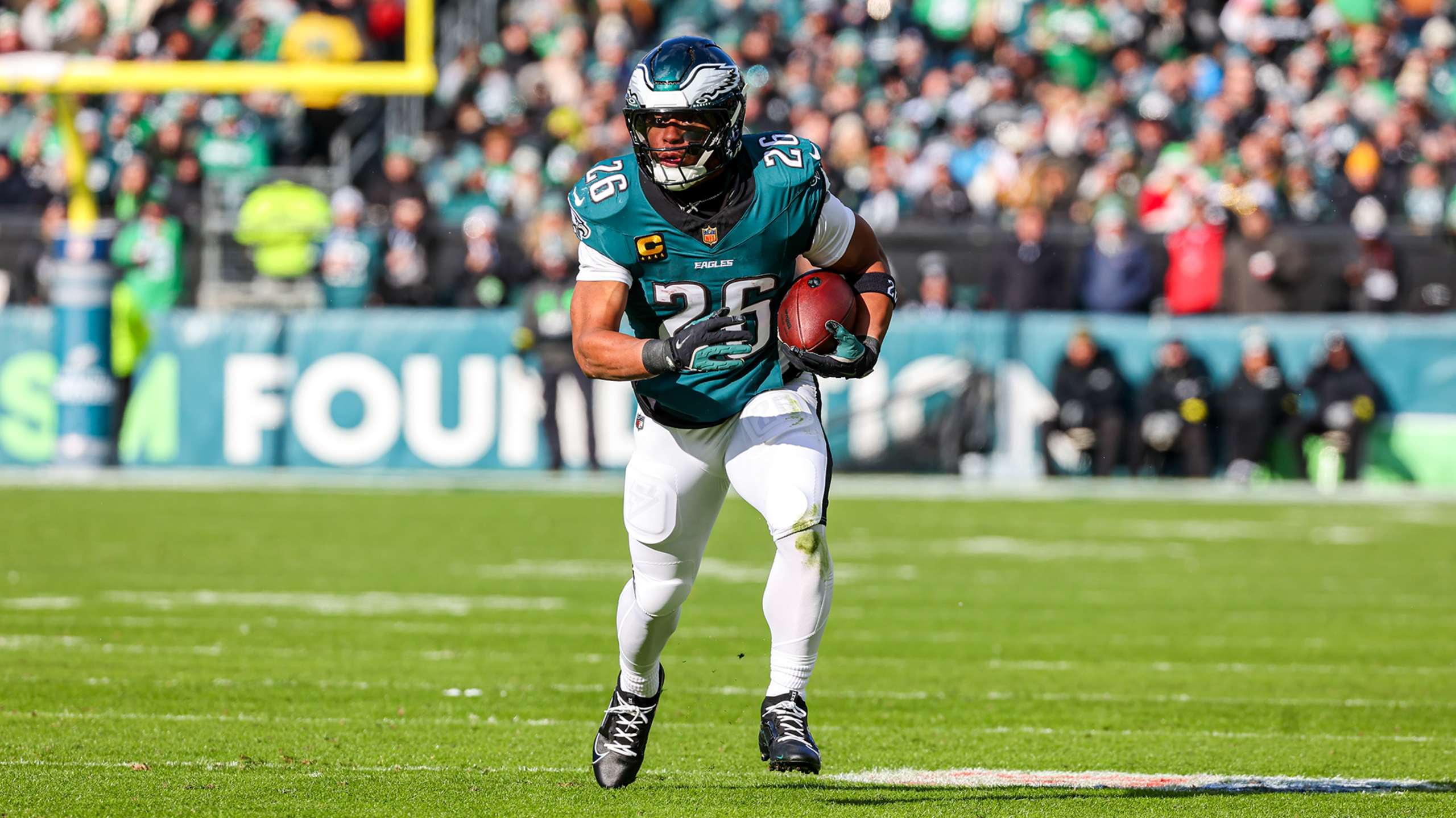Eagles running back Saquon Barkley runs with the ball in a 31-0 win over the Raiders in Week 15 of the 2025 NFL season.