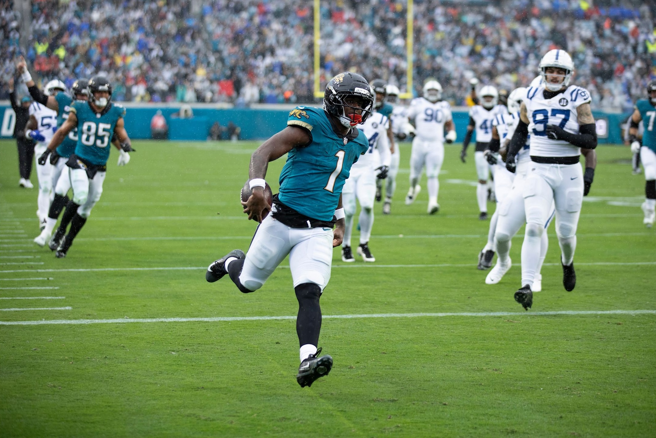 Jaguars running back Travis Etienne Jr. runs for a touchdown in a 36-19 win over the Colts in Week 14 of the 2025 NFL season.