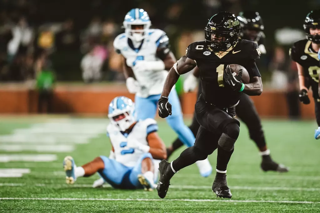 Wake Forest running back Demond Claiborne runs in the open field in a win over North Carolina during the 2025 college football season.