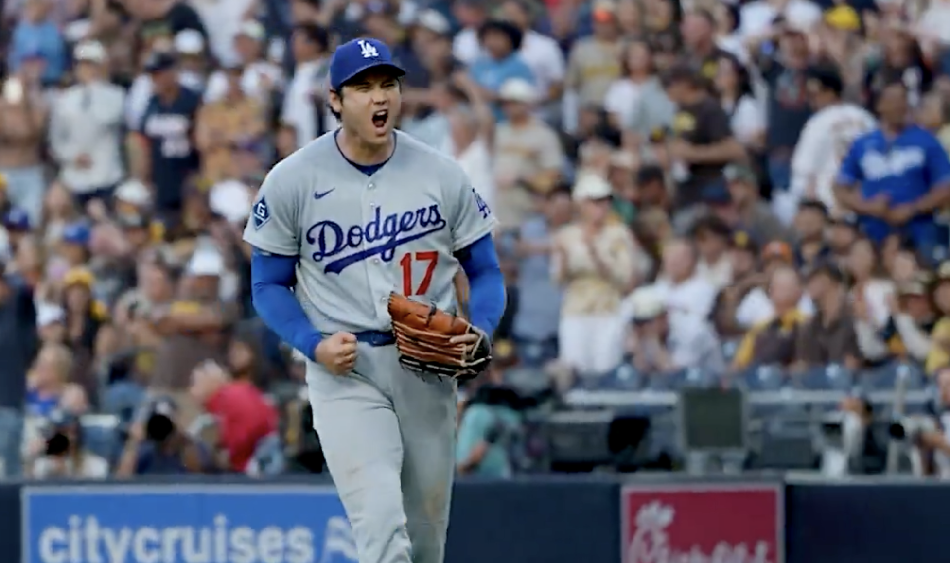 Dodgers pitcher Shohei Ohtani celebrates to end the inning during a 2026 MLB game.