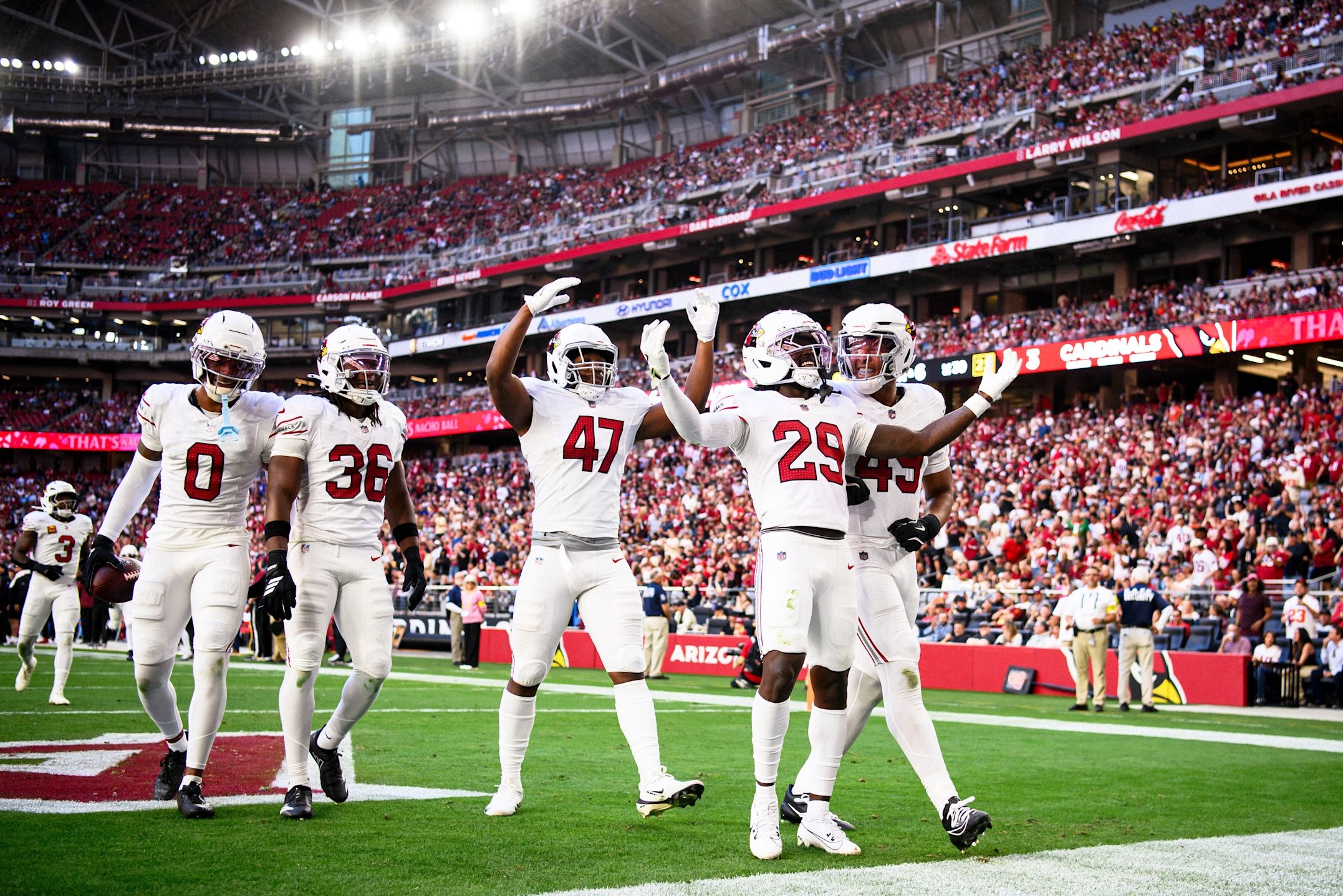 Arizona Cardinals cornerback Denzel Burke celebrates with teammates during the 2025 NFL season.