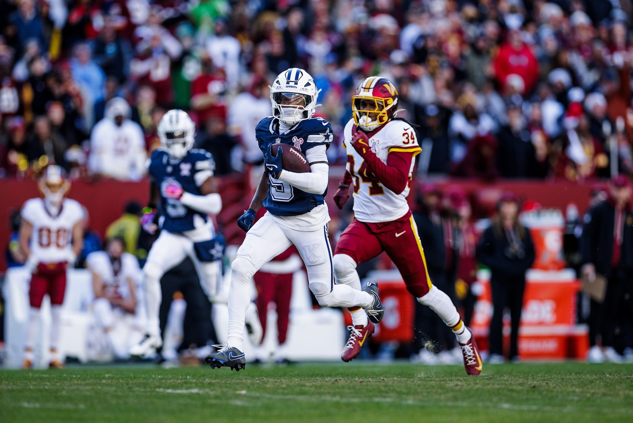 Cowboys wide receiver KaVontae Turpin runs in the open field in a win over the Commanders on Christmas Day during the 2025 NFL season.