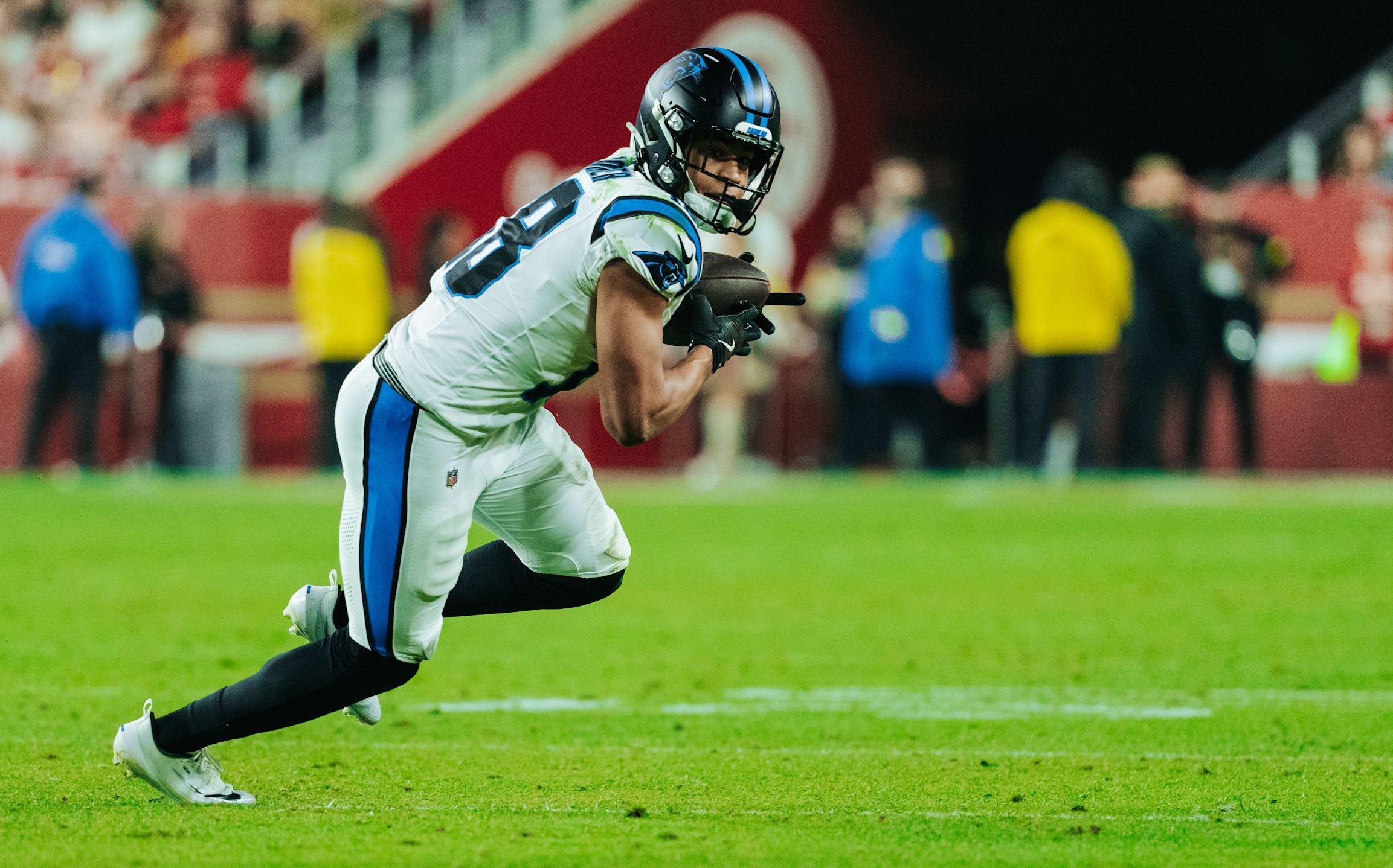 Panthers wide receiver Jalen Coker runs after the catch during the 2025 NFL season.